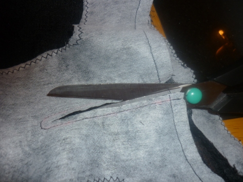 cutting the front of tunic