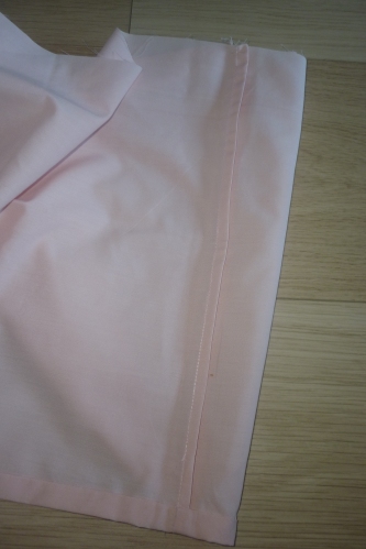 French seam on girls pink skirt